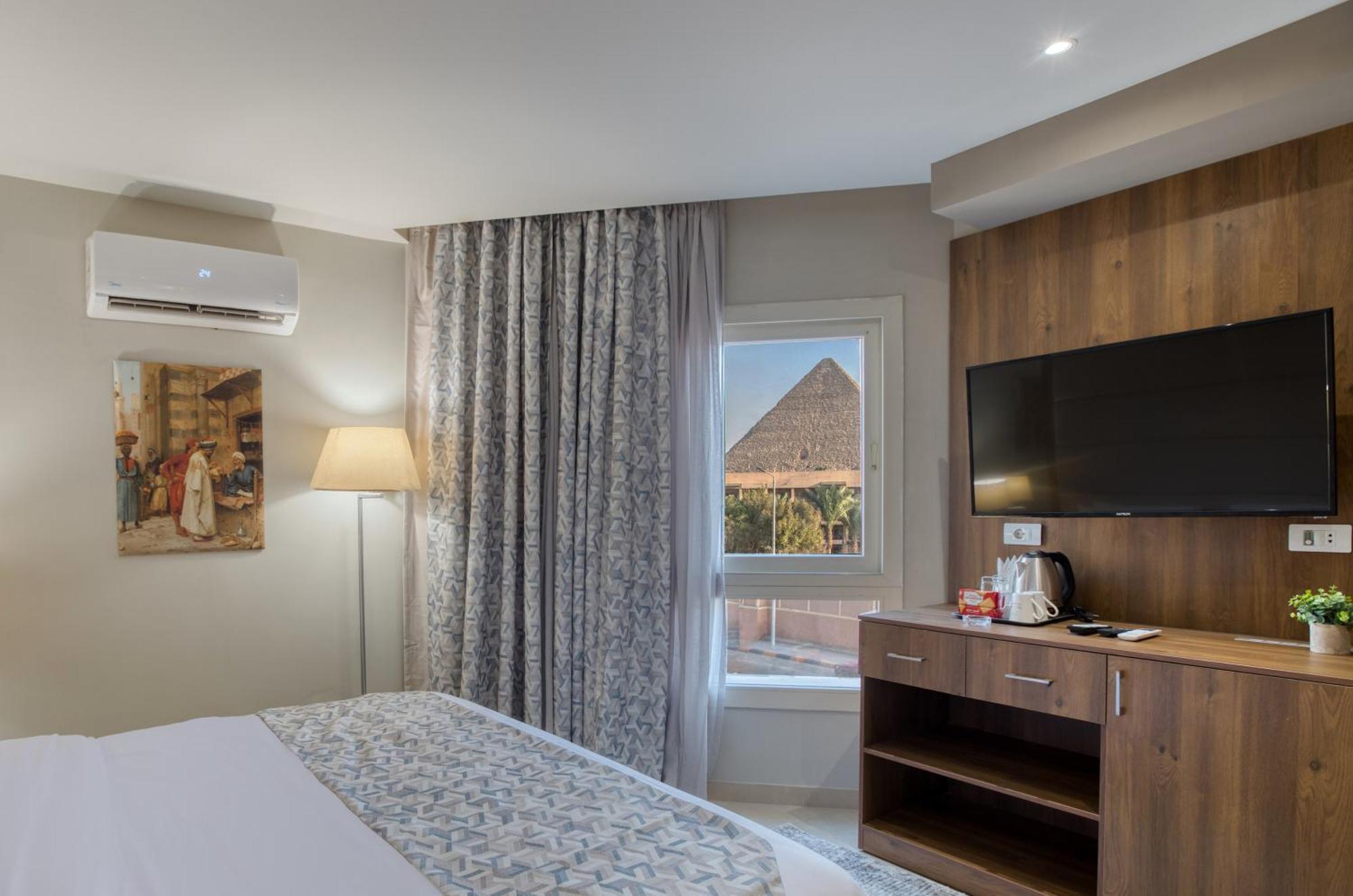 Nozol Pyramids Hotel And Spa Kafrat al Jabal Exterior photo
