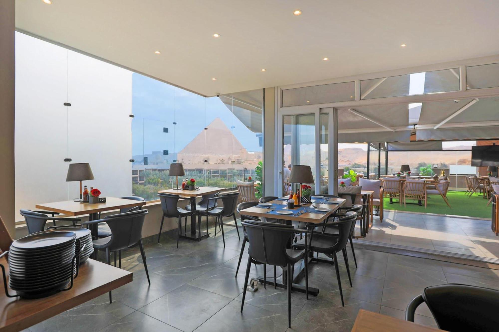 Nozol Pyramids Hotel And Spa Kafrat al Jabal Exterior photo